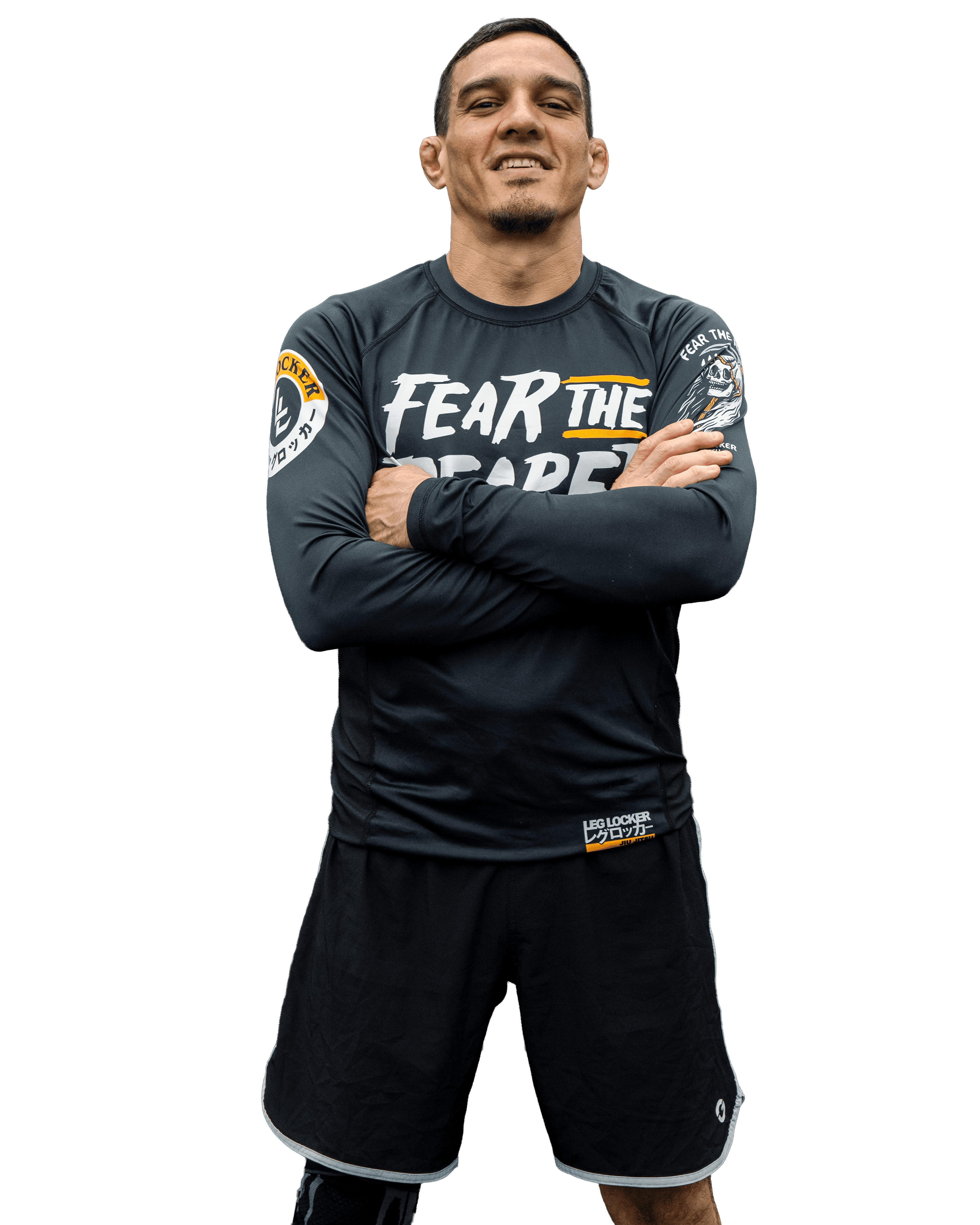 Coach Jake Tapia standing with arms crossed